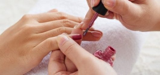 Pick Me Up Spa Package Square Image of Hands of therapist applying nail polish