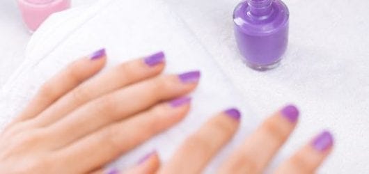 Gel Manicure Square Image of Nail care: manicurist applying lacquer.