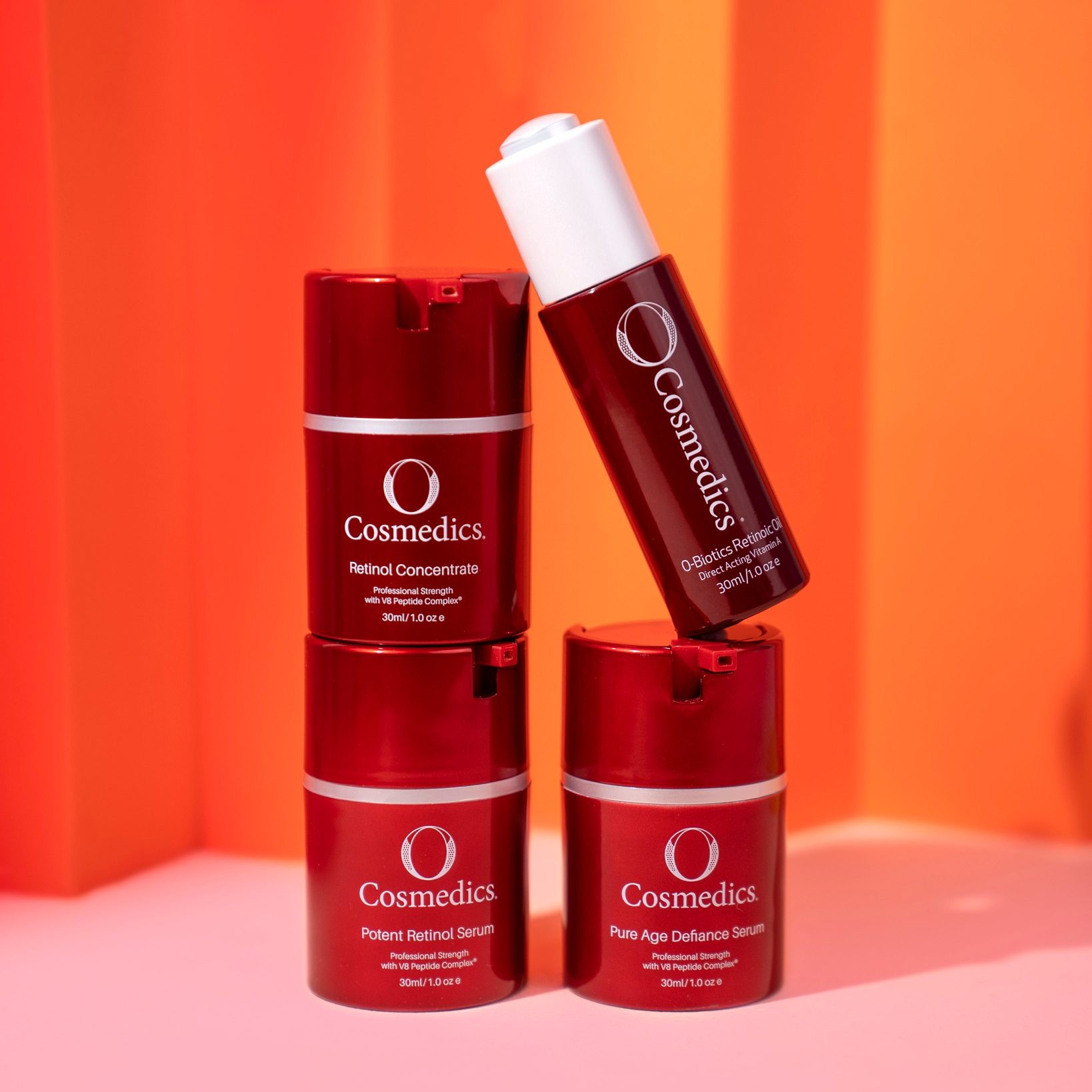 O Cosmedics Potent Retinol Serum group shot of 4 products stacked on top of each other