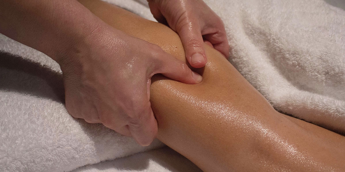 woman having a deep tissue massage in Christchurch nz
